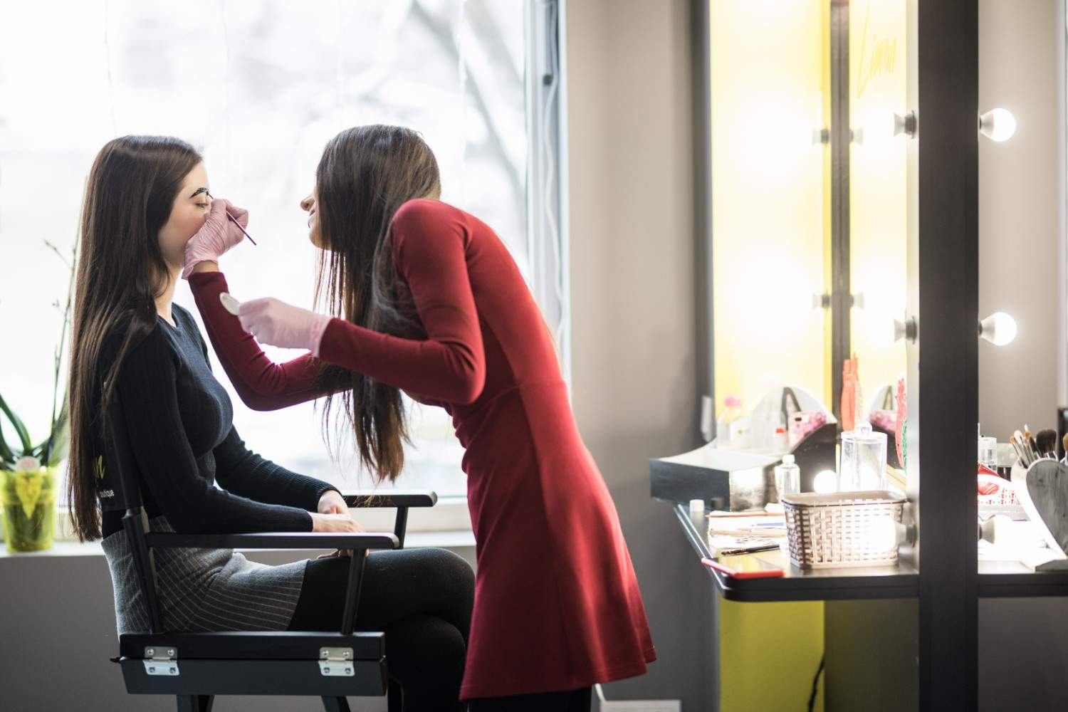 Beauty advisor supporting a cosmetics customer during retail consultation and store audit
